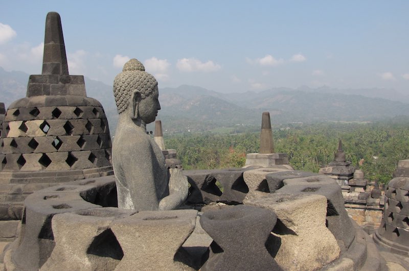 Buddha statue in stupa, Borobudur